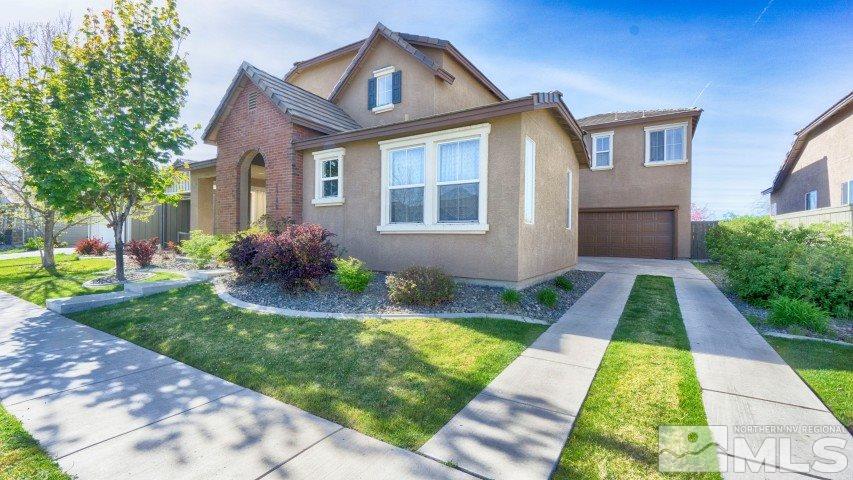 1780 Granite Chief Drive Reno, NV 89521 - Photo 1 of 1 a front view of house with yard and green space