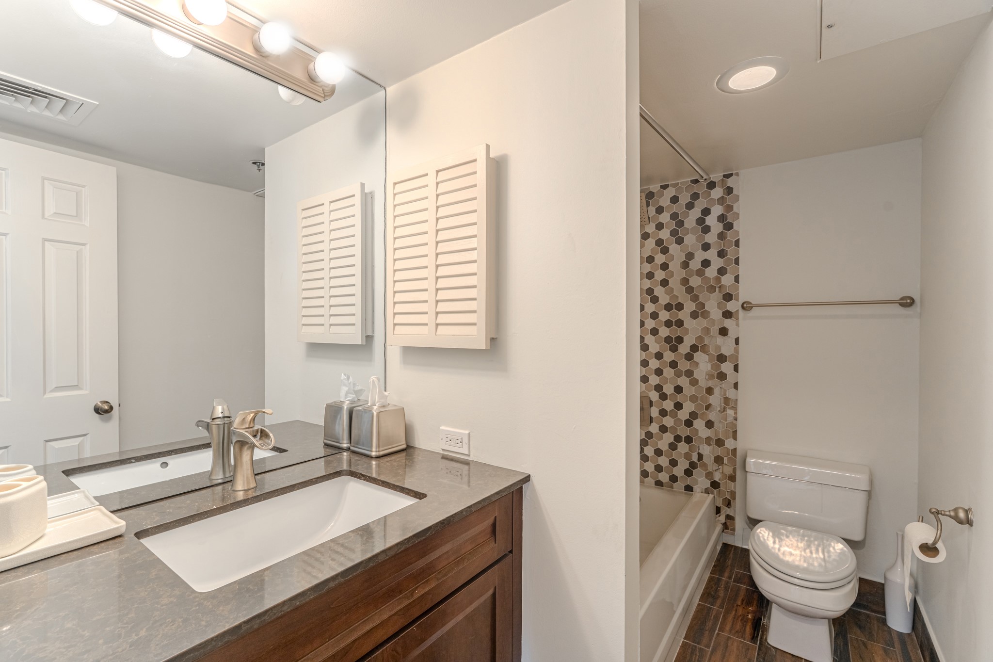 3525 Sage Road, Unit 1016 Houston, TX 77056 - Photo 41 of 42 a bathroom with a granite countertop sink toilet and shower