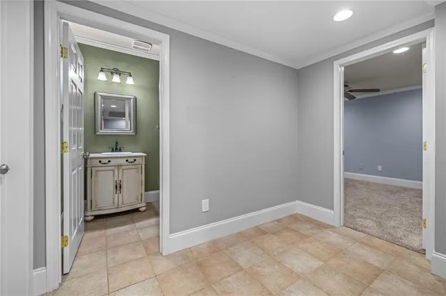 a view of a hallway with washer and dryer