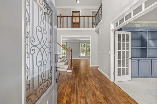 a view of entryway with wooden floor