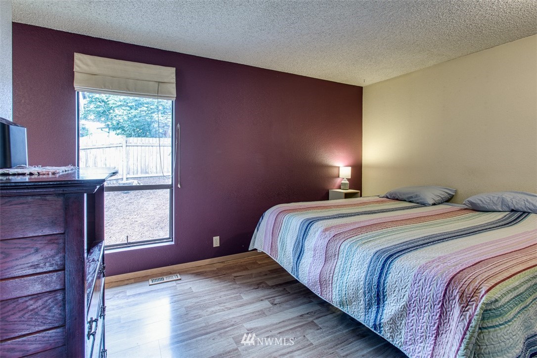 3776 Magrath Road Bellingham, WA 98226 - Photo 15 of 23 a bedroom with a bed and a window