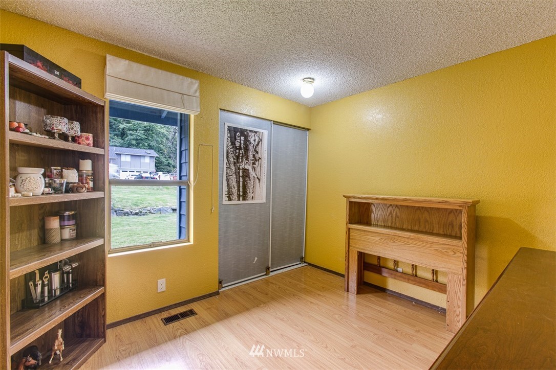3776 Magrath Road Bellingham, WA 98226 - Photo 18 of 23 a view of room with window and cabinet