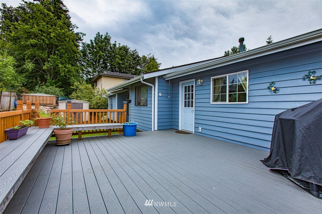 3776 Magrath Road Bellingham, WA 98226 - Photo 19 of 23 a view of a house with sitting area and furniture