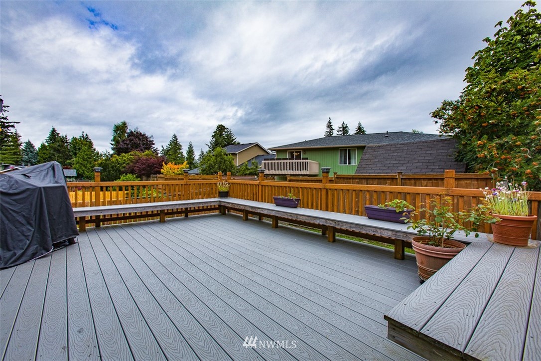3776 Magrath Road Bellingham, WA 98226 - Photo 20 of 23 a view of a terrace with wooden benches and couch