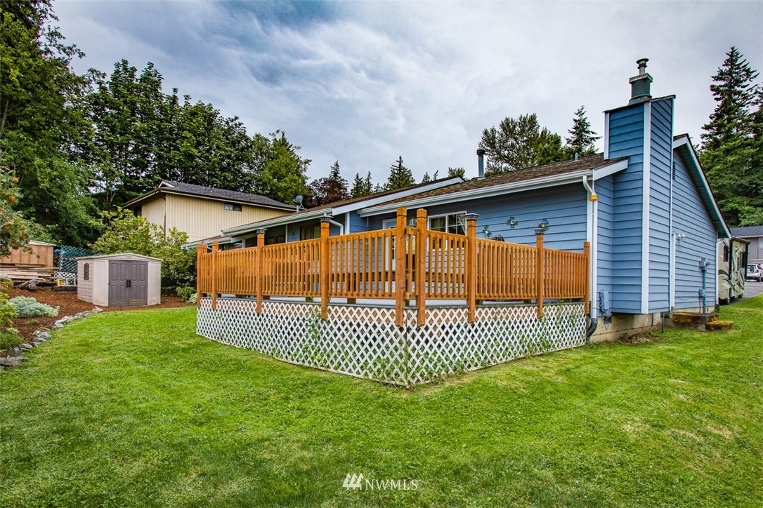 3776 Magrath Road Bellingham, WA 98226 - Photo 21 of 23 a view of a backyard with a small cabin