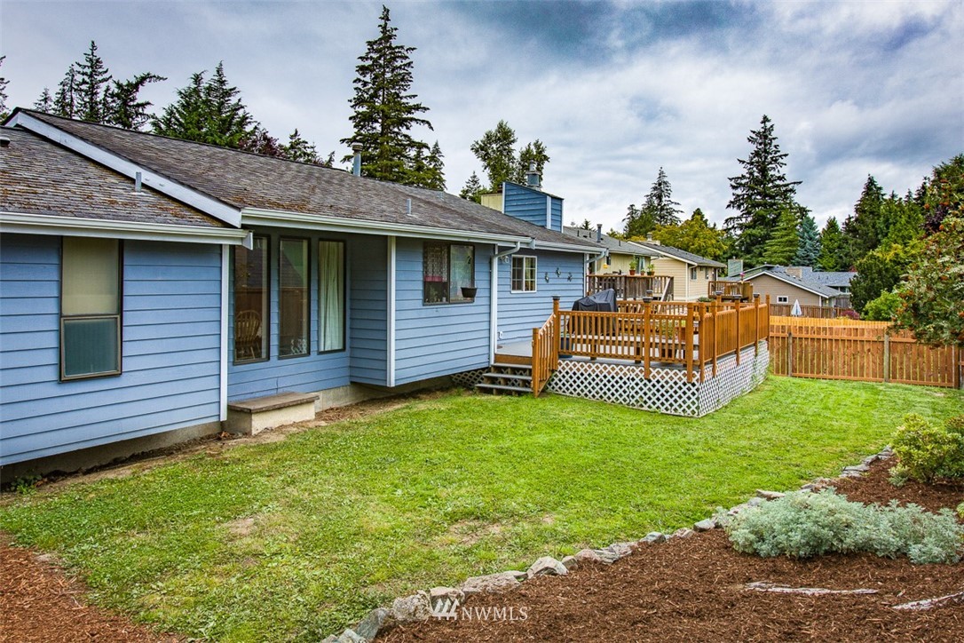 3776 Magrath Road Bellingham, WA 98226 - Photo 22 of 23 a view of a house with a backyard