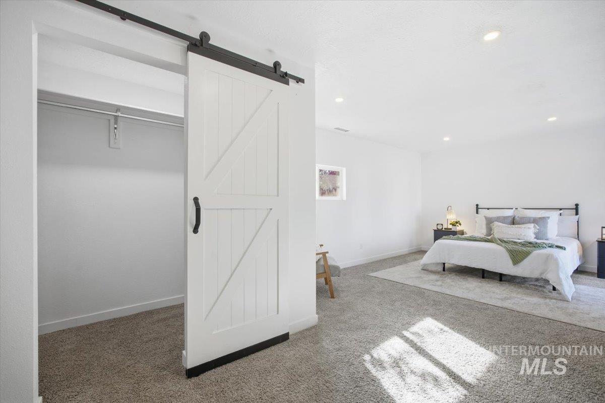 1407 South Roosevelt Street Boise, ID 83705 - Photo 23 of 38 Bedroom featuring carpet and recessed lighting