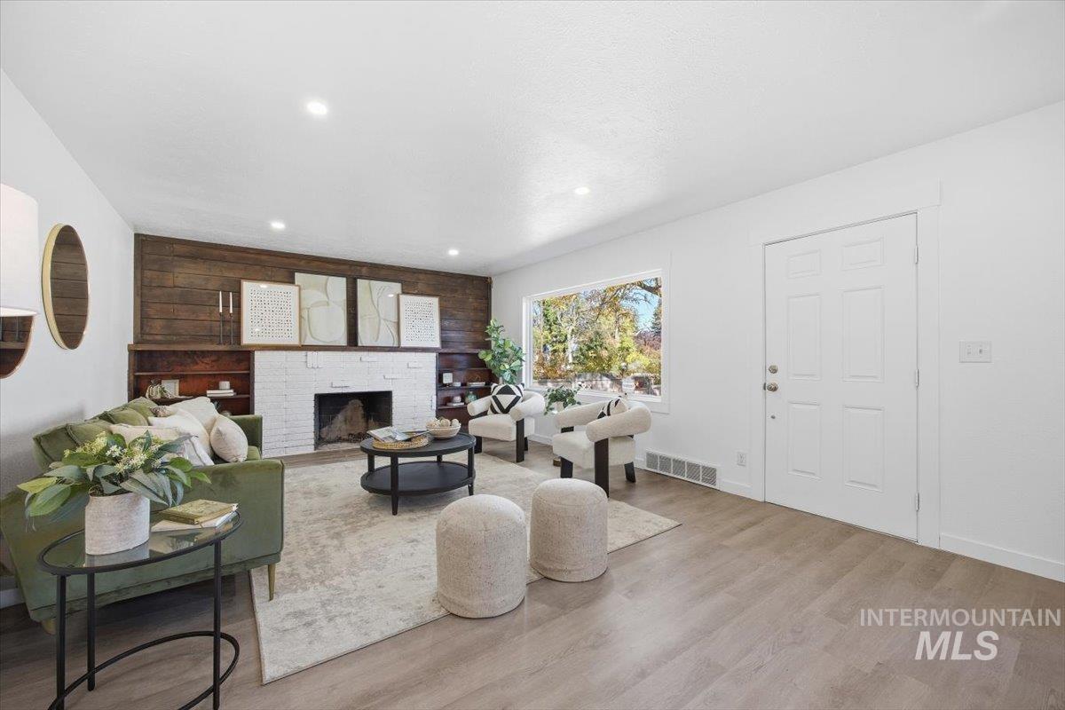1407 South Roosevelt Street Boise, ID 83705 - Photo 5 of 38 Living room with a brick fireplace, light wood finished floors, and recessed lighting