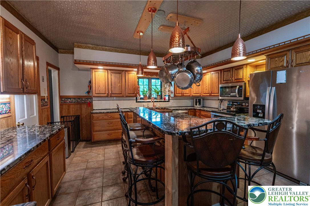 2485 Hieter Road Quakertown, PA 18951 - Photo 17 of 97 Custom cabinetry and ample counter space create a functional, inviting kitchen.