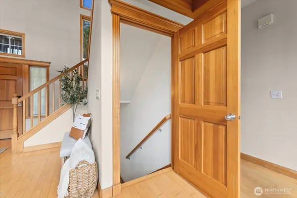 a view of a hallway with staircase