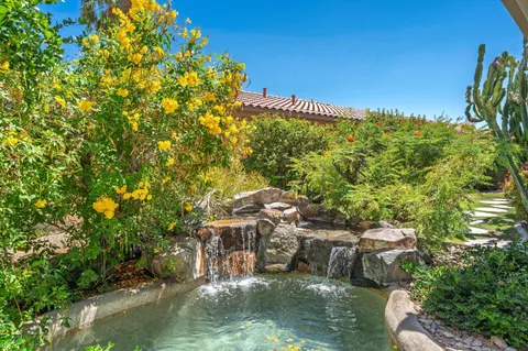 a patio with table and chairs