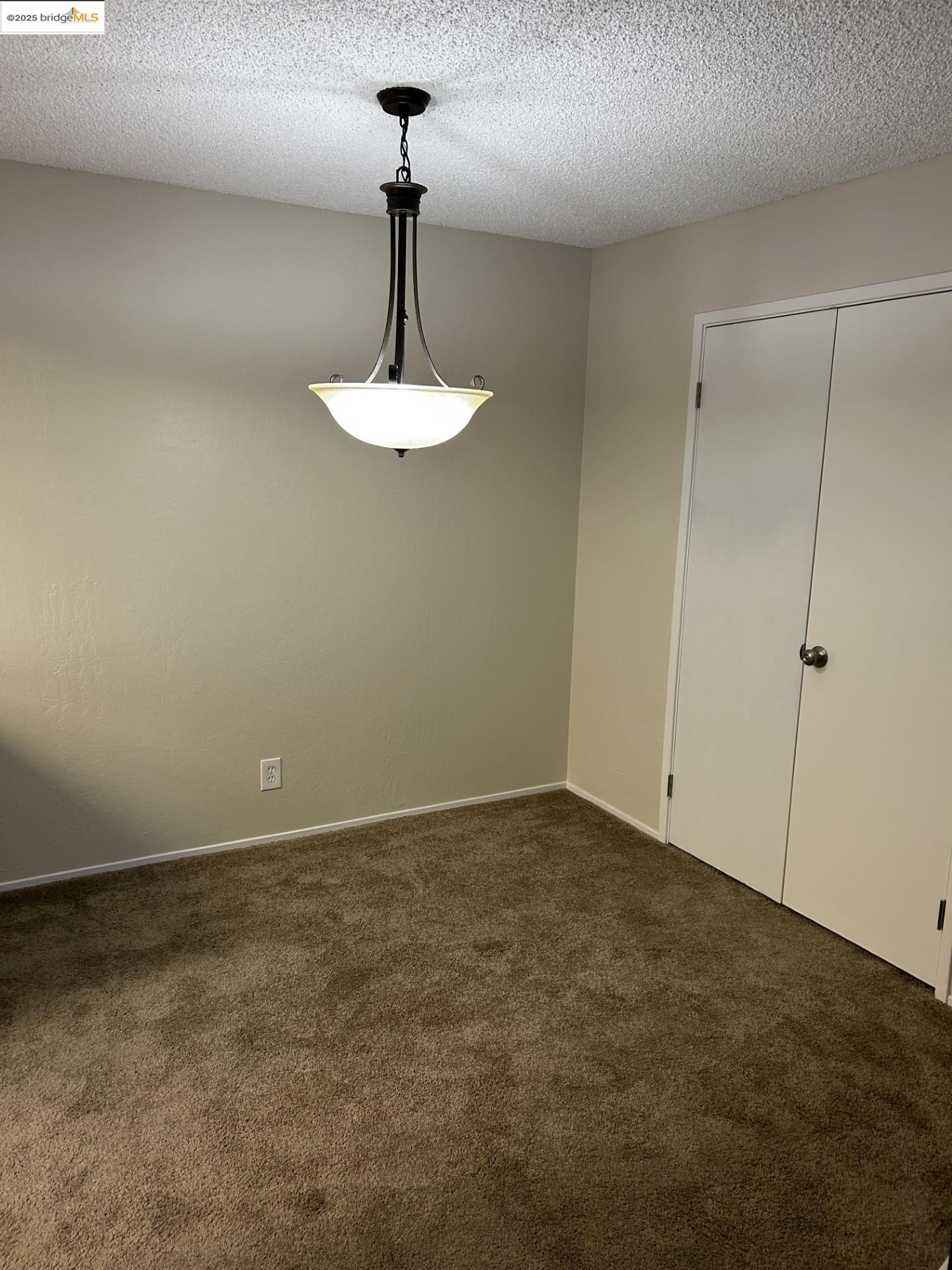 1363 Ridgecrest Road Pinole, CA 94564 - Photo 17 of 37 a view of a chandelier fan in a room