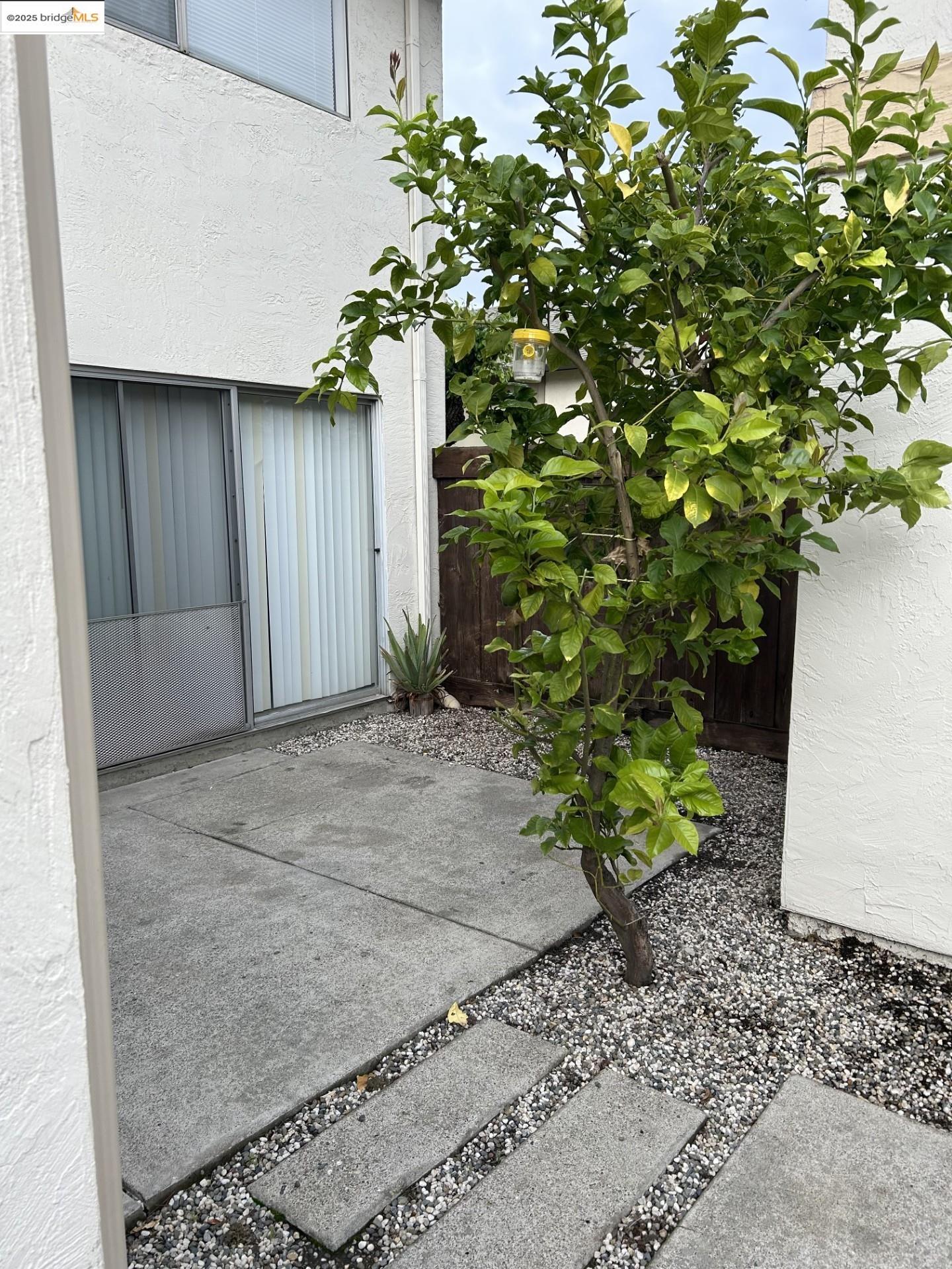 1363 Ridgecrest Road Pinole, CA 94564 - Photo 22 of 37 a view of a house with a tree