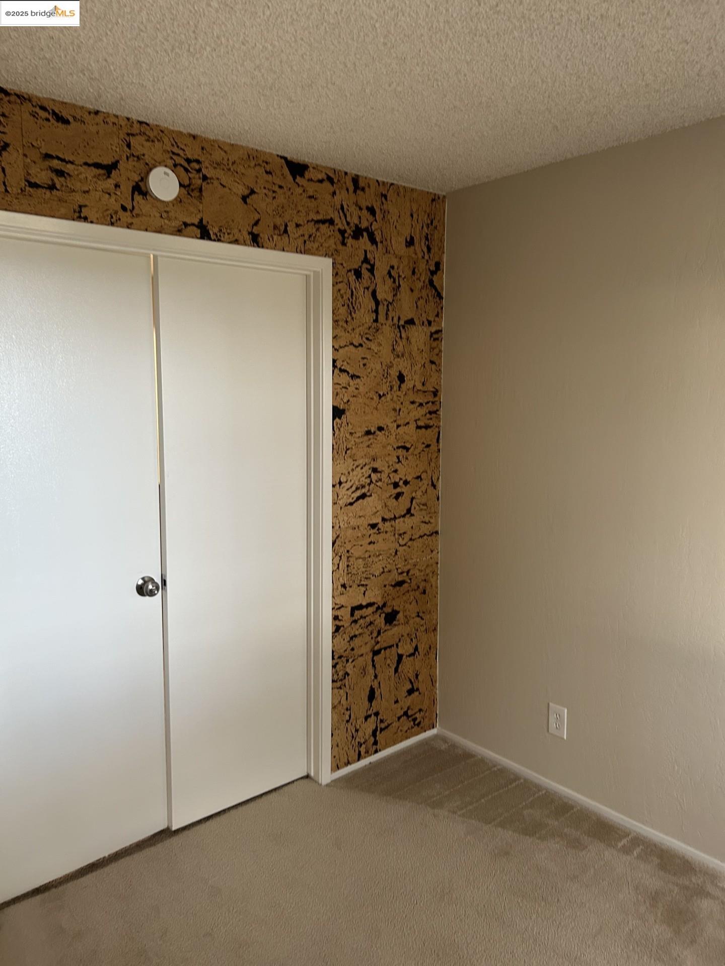1363 Ridgecrest Road Pinole, CA 94564 - Photo 24 of 37 an empty room with a door