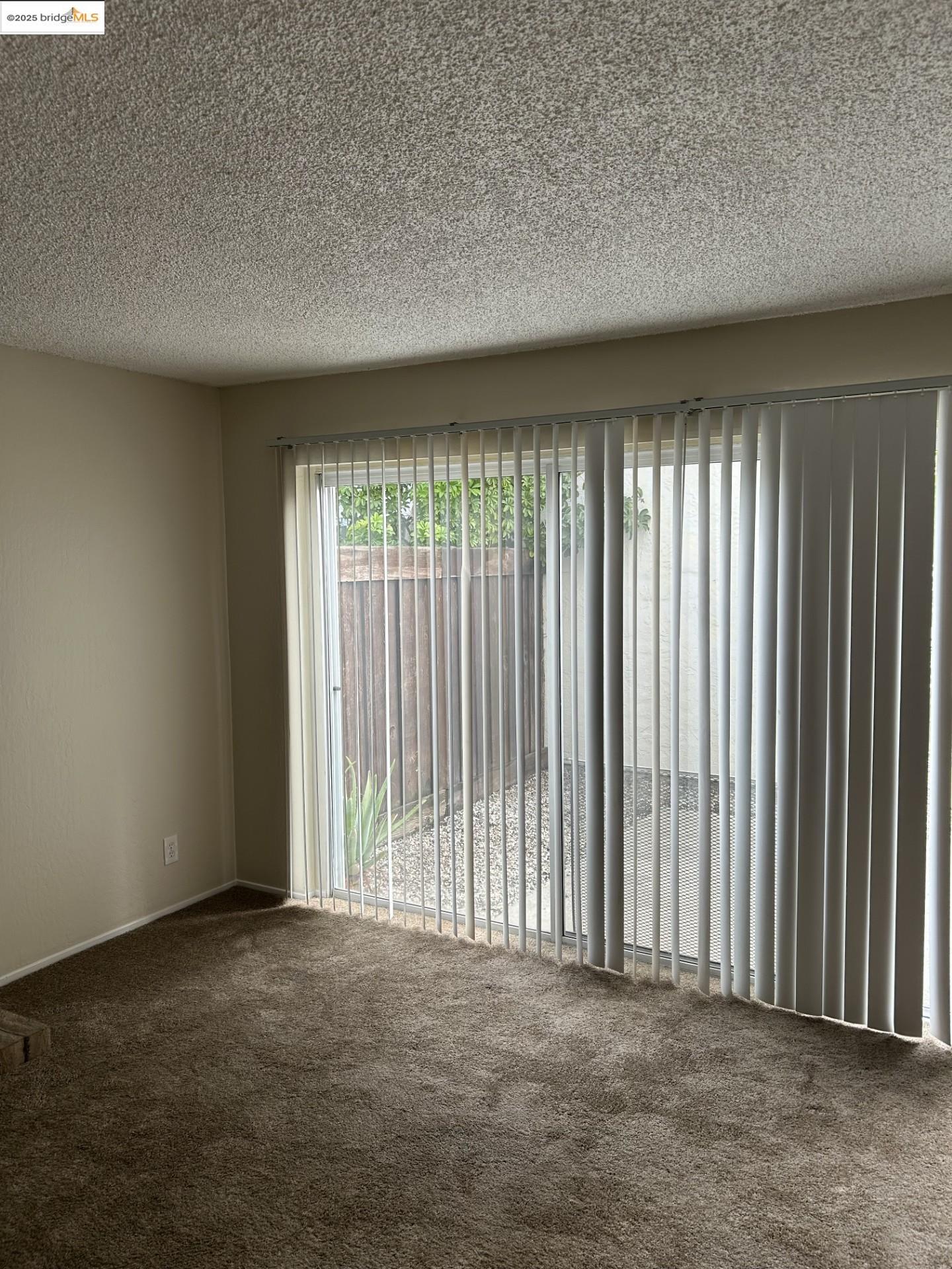 1363 Ridgecrest Road Pinole, CA 94564 - Photo 28 of 37 an empty room with windows