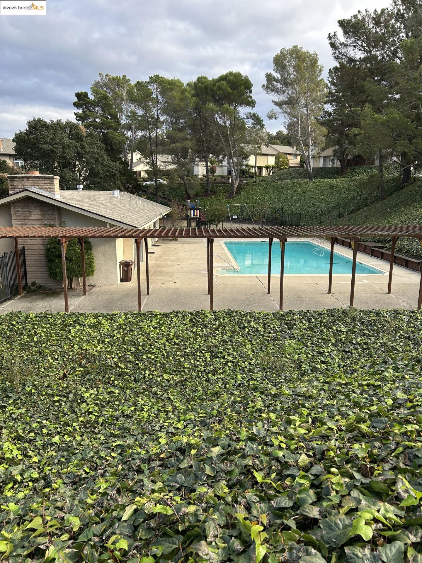 1363 Ridgecrest Road Pinole, CA 94564 - Photo 3 of 37 a view of a yard in front of a house