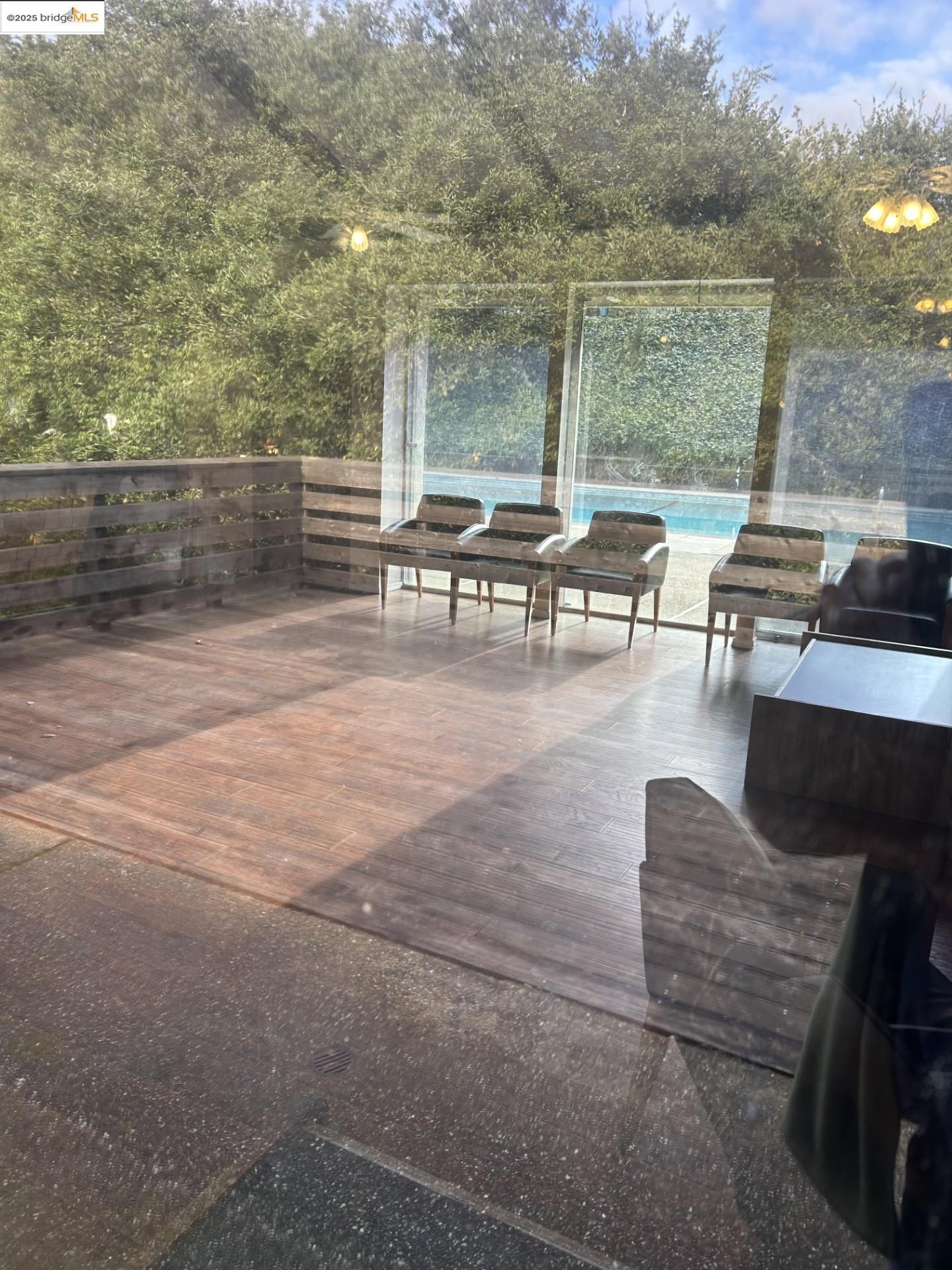 1363 Ridgecrest Road Pinole, CA 94564 - Photo 6 of 37 a view of a terrace with furniture and a yard