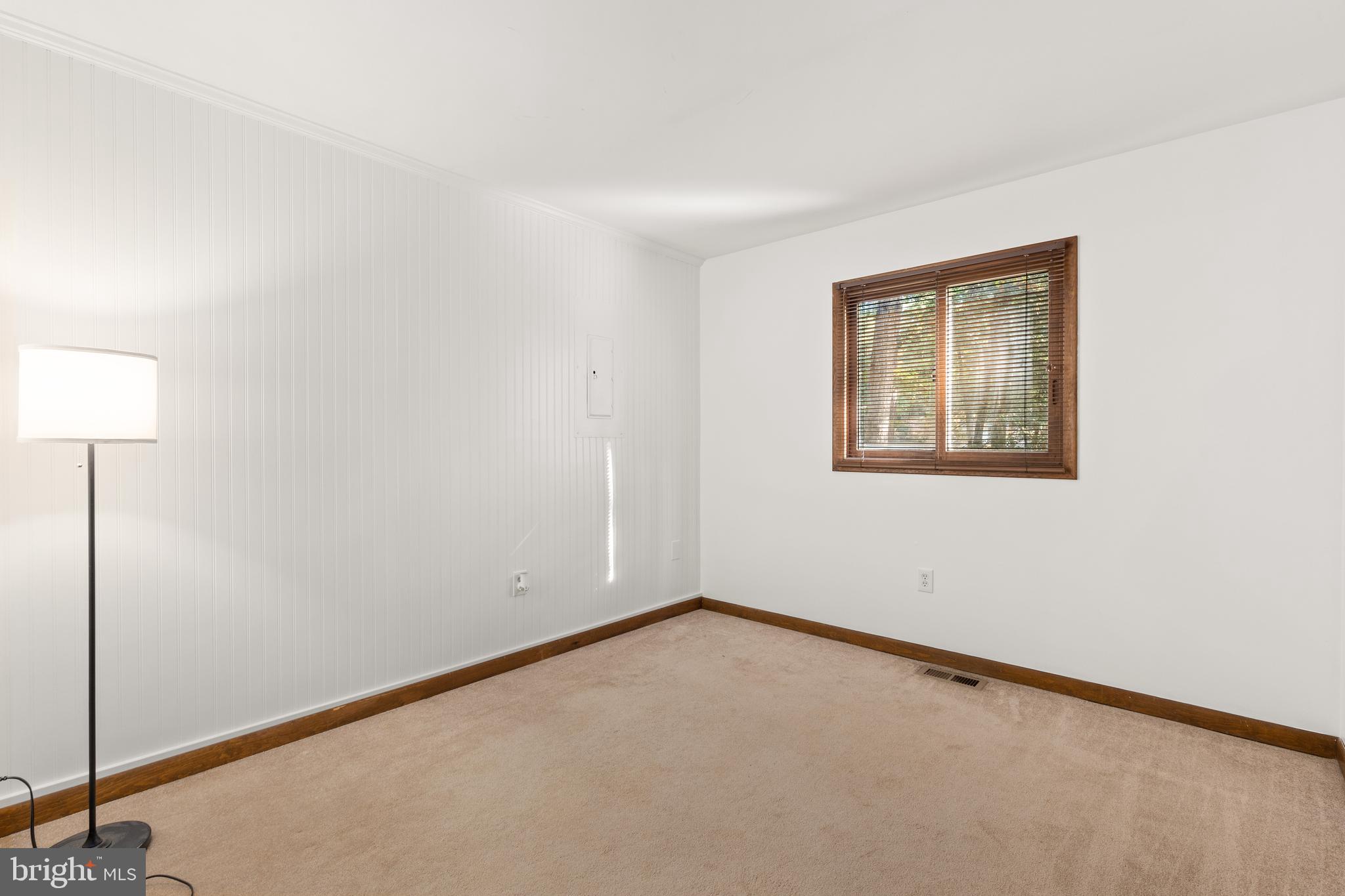 38 Canal Road Ocean Pines, MD 21811 - Photo 20 of 40 a view of an empty room with a window