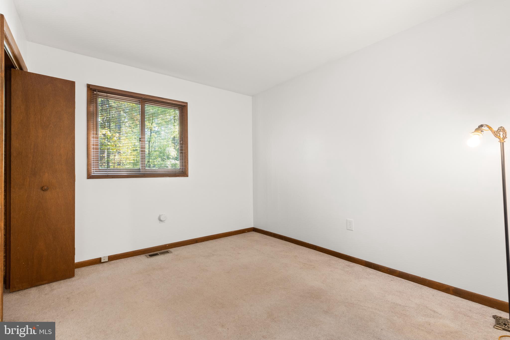 38 Canal Road Ocean Pines, MD 21811 - Photo 21 of 40 an empty room with a window