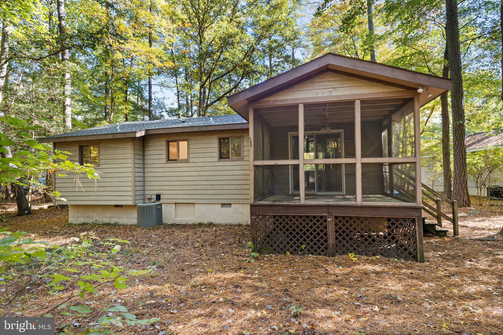 38 Canal Road Ocean Pines, MD 21811 - Photo 28 of 40 a front view of a house with garden
