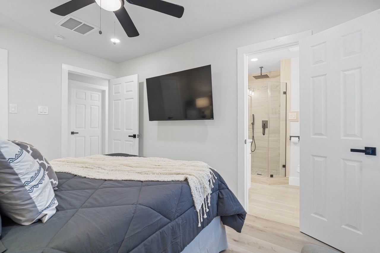 3138 Sunbeam Street Houston, TX 77051 - Photo 30 of 50 A private retreat awaits with spa-inspired finishes, modern comfort, and seamless access to the beautifully updated ensuite bath.