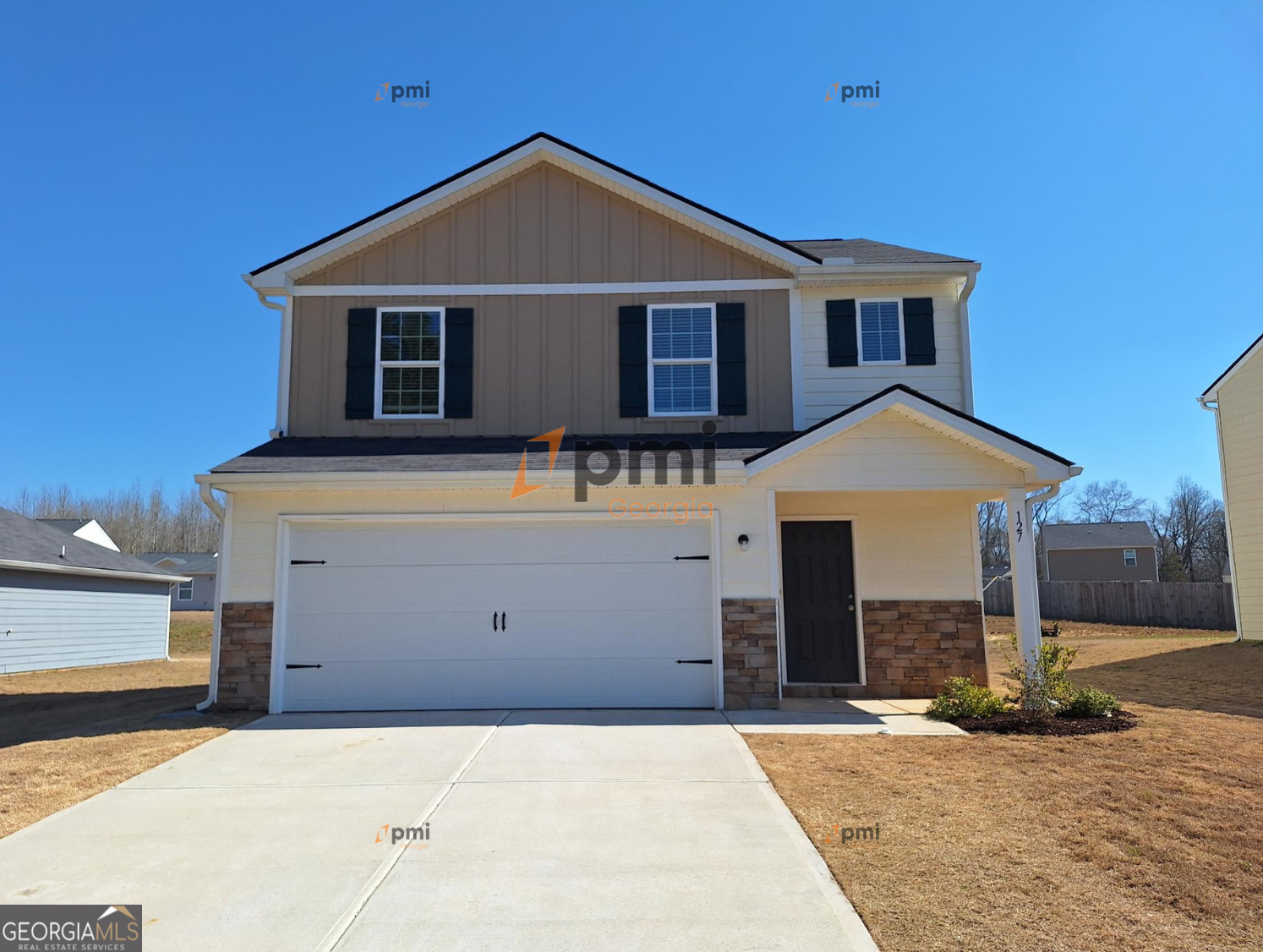 127 Maple Drive Milner, GA 30257 - Photo 1 of 1 a front view of a house with a yard