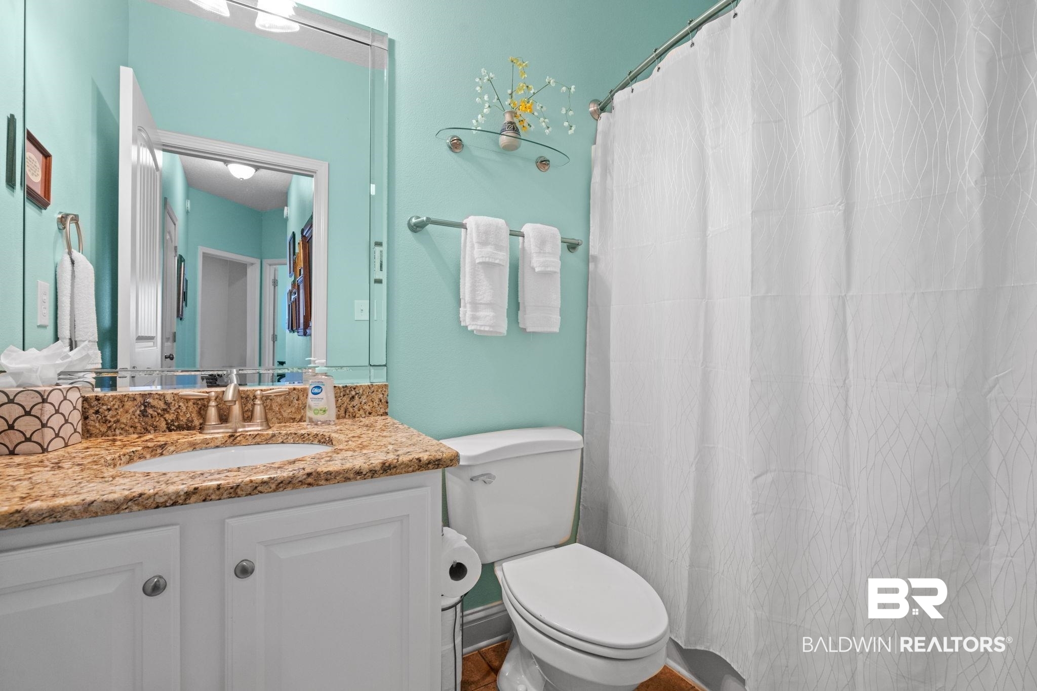 2554 Masters Court Mobile, AL 36618 - Photo 25 of 35 Bathroom featuring vanity and a shower with shower curtain