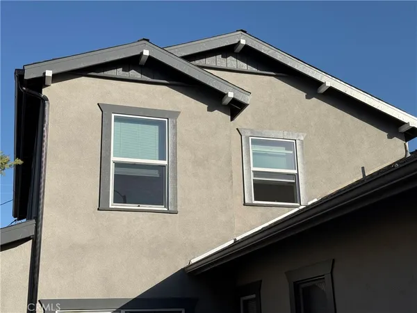 a front view of a house with windows