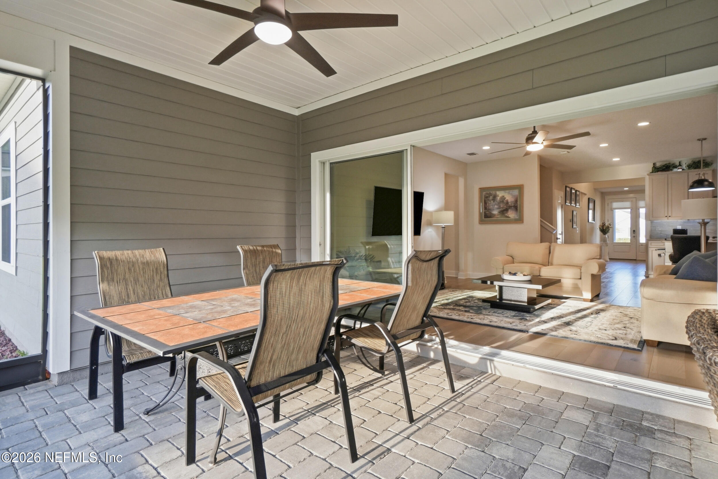 34 Red Rock Lane St. Johns, FL 32259 - Photo 47 of 71 a view of a livingroom with furniture and a dining table