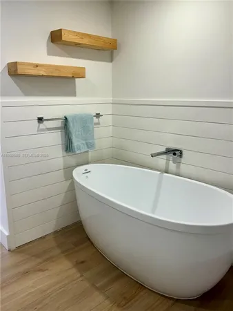 a bathroom with a bathtub