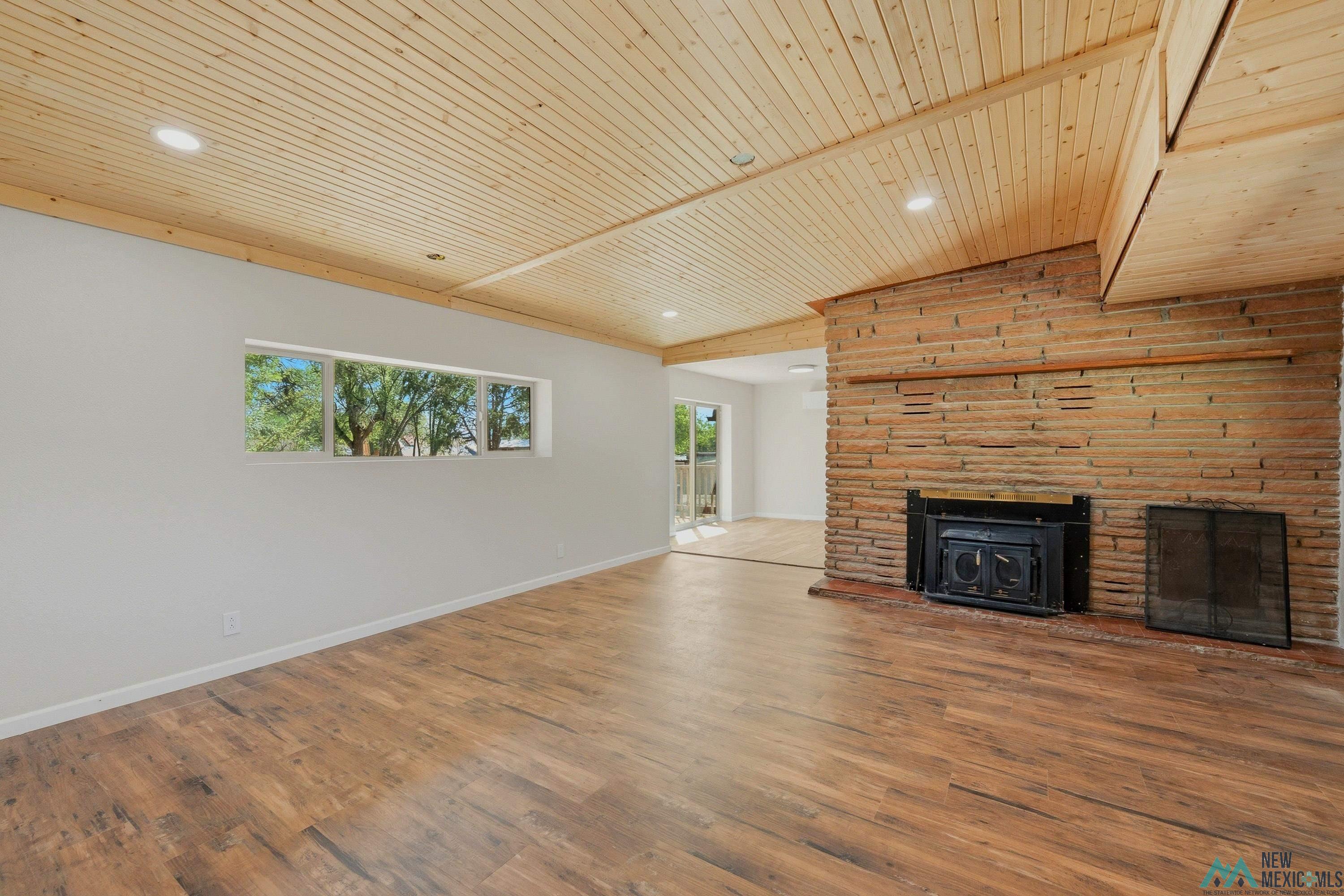 544 South 13th Avenue Raton, NM 87740 - Photo 6 of 37 Vaulted wood-paneled ceiling with recessed lighting