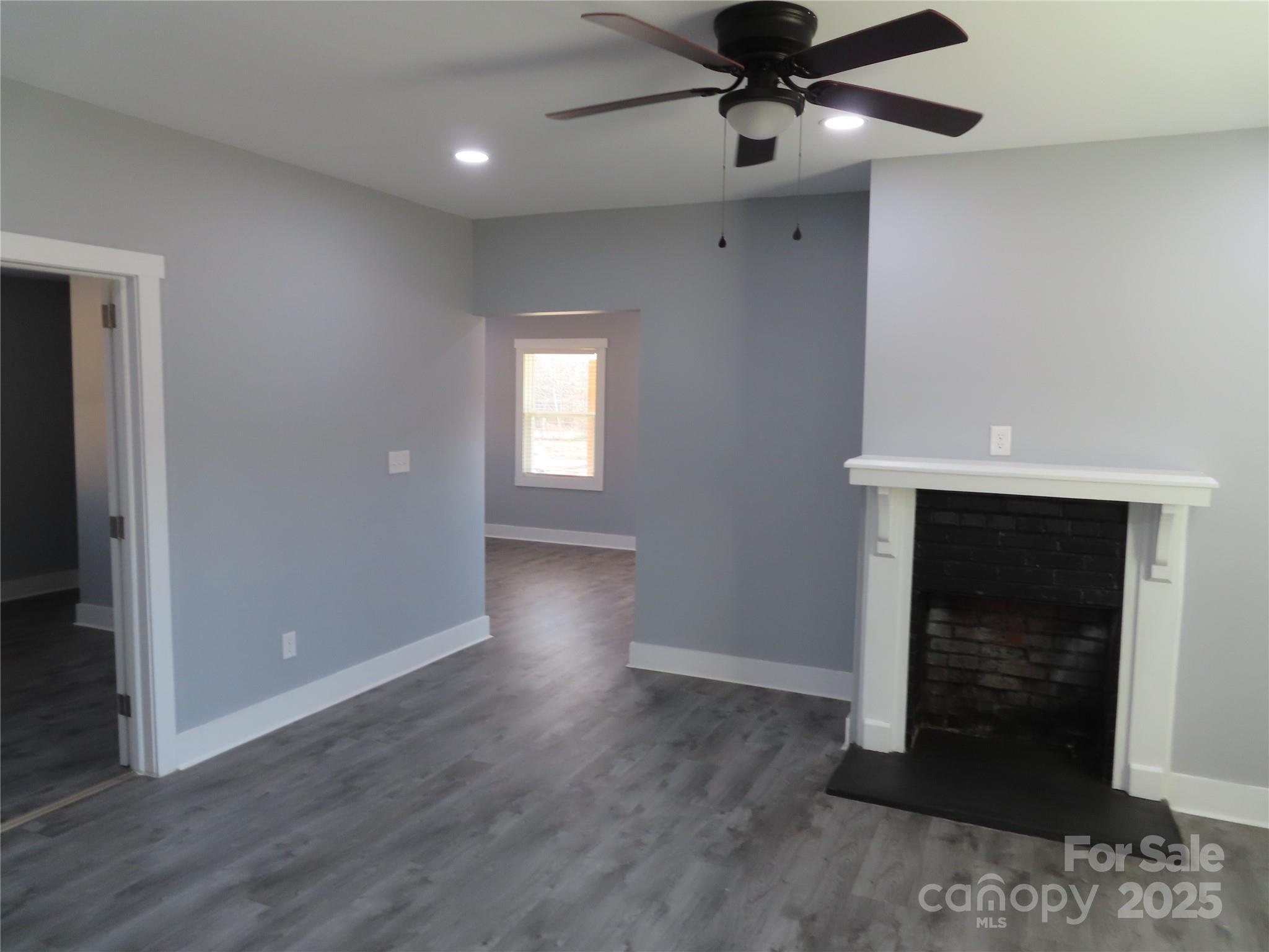 605 State Road 182 Chester, SC 29706 - Photo 16 of 32 a view of an empty room with a window and wooden floor