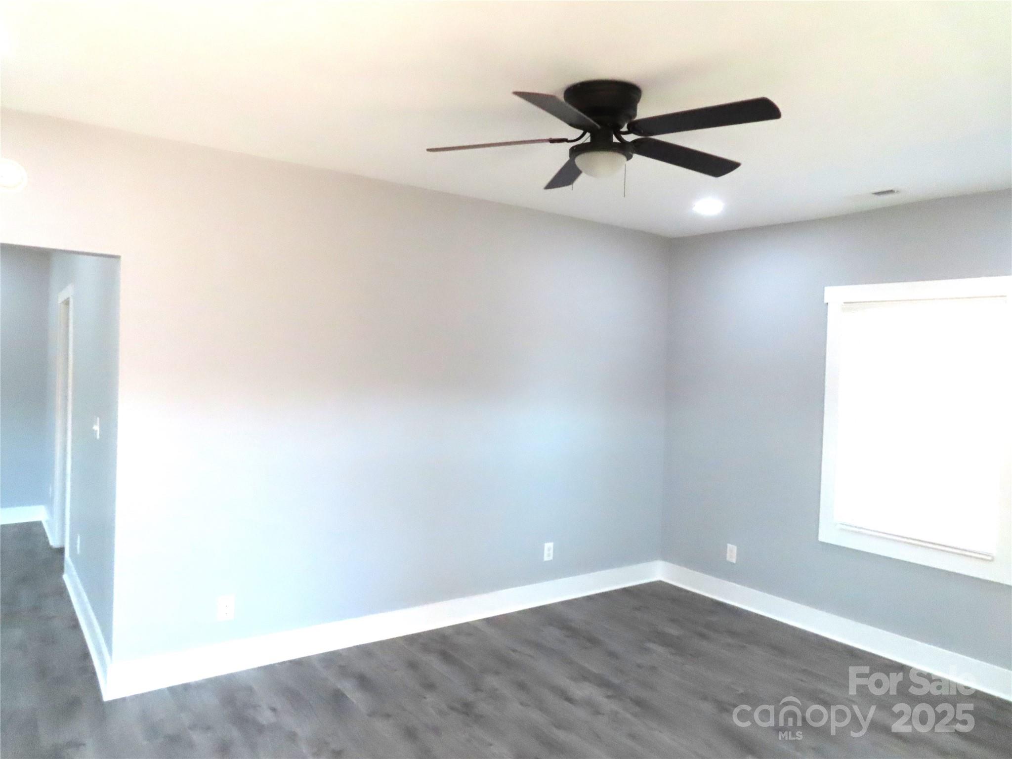 605 State Road 182 Chester, SC 29706 - Photo 20 of 32 a view of a room with a ceiling fan and wooden floor