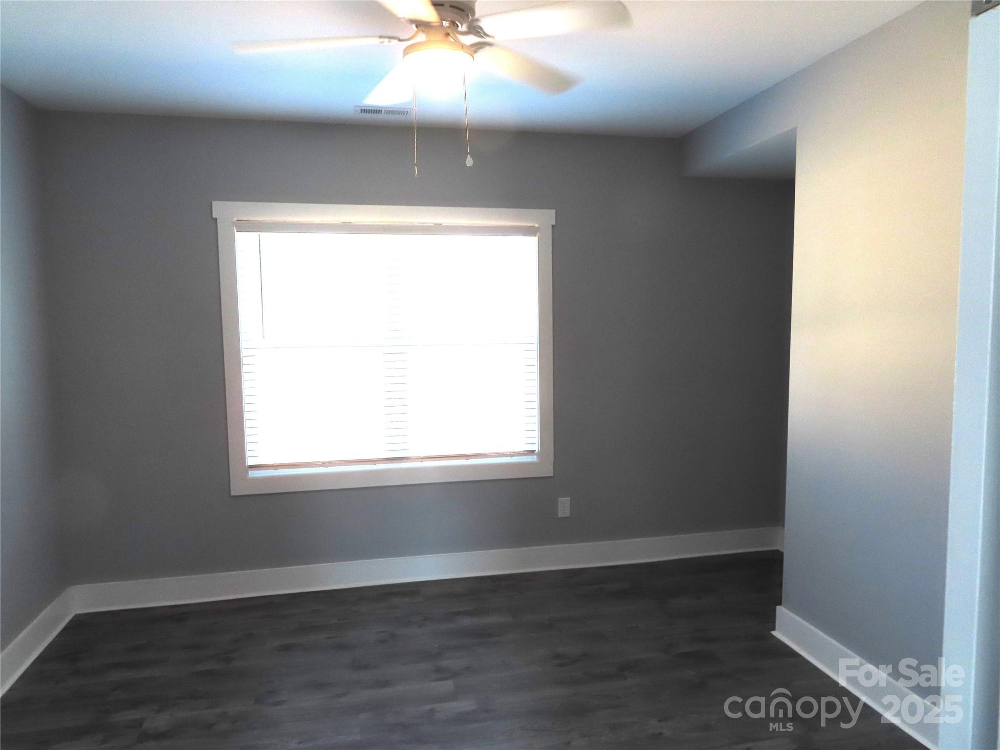 605 State Road 182 Chester, SC 29706 - Photo 24 of 32 an empty room with wooden floor and windows