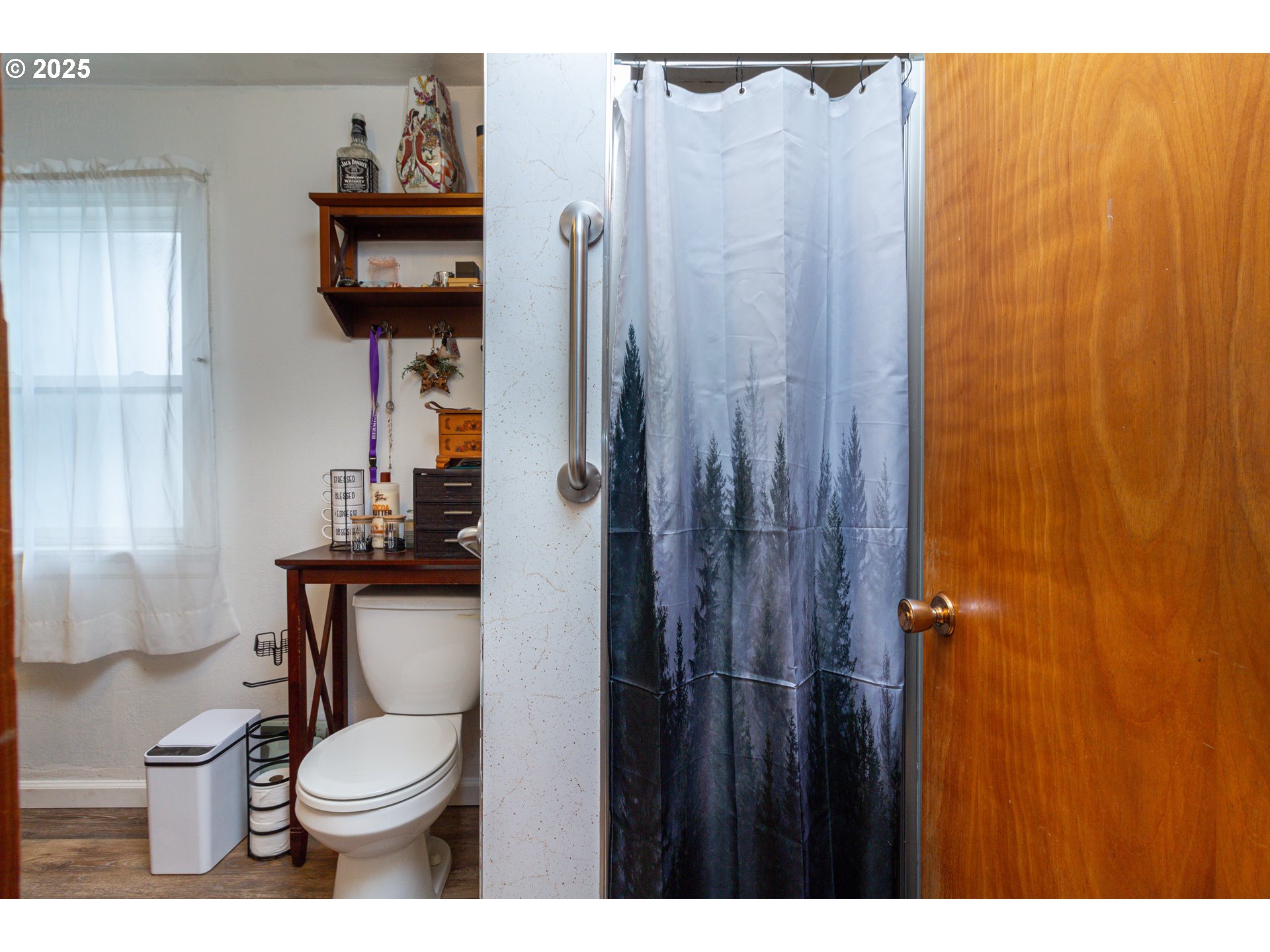 11 South Thielsen Street Echo, OR 97826 - Photo 3 of 14 a bathroom with a toilet a sink and curtain