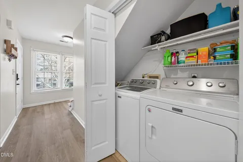 a utility room with washer and dryer