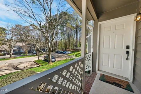 a view of a porch with a yard