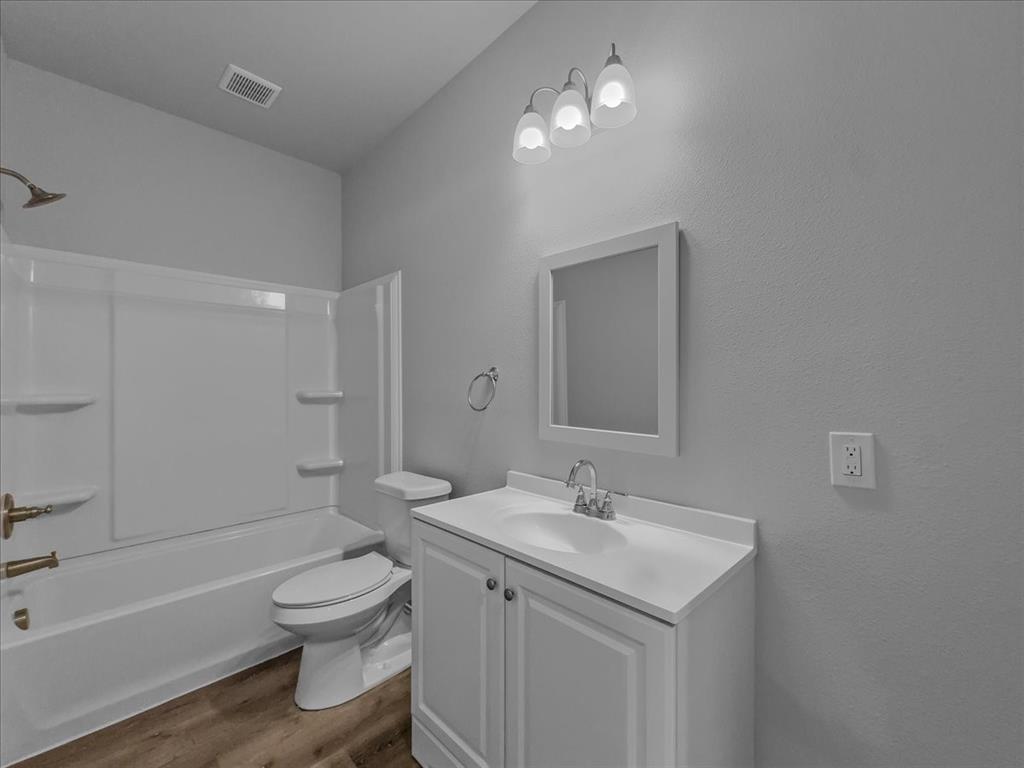 2 Bowling Lane Blue Ridge, TX 75424 - Photo 7 of 14 a bathroom with a sink toilet and shower