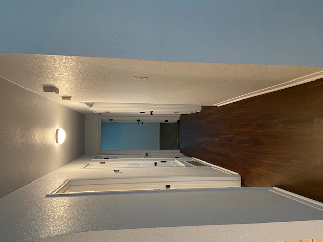 3700 Dustin Court, Unit B Killeen, TX 76549 - Photo 12 of 18 a view of a hallway with wooden floor