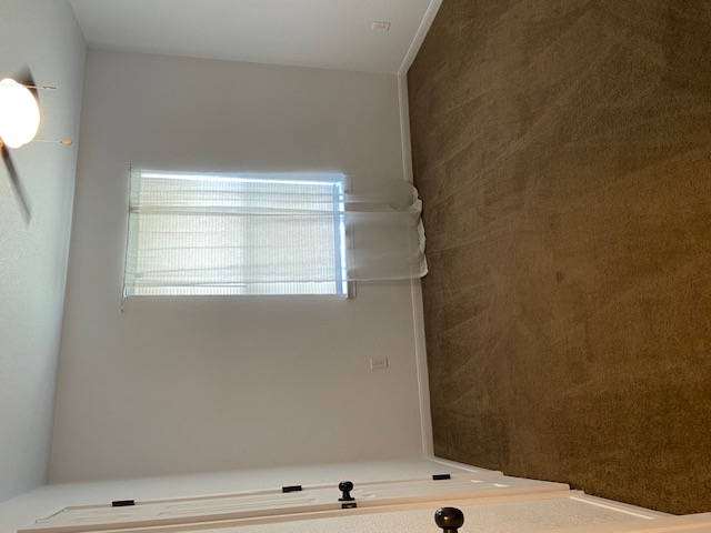 3700 Dustin Court, Unit B Killeen, TX 76549 - Photo 13 of 22 Spare room featuring dark carpet and a ceiling fan
