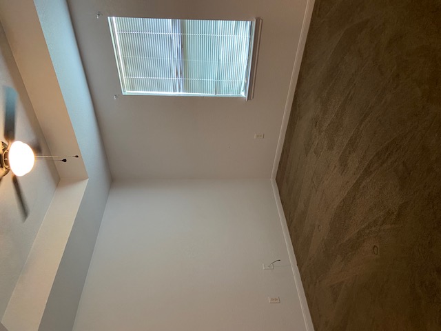 3700 Dustin Court, Unit B Killeen, TX 76549 - Photo 16 of 22 Unfurnished room with dark colored carpet, a tray ceiling, and ceiling fan