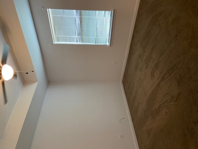 3700 Dustin Court, Unit B Killeen, TX 76549 - Photo 17 of 22 Empty room featuring dark carpet, a tray ceiling, and a ceiling fan