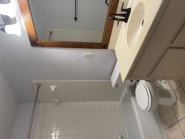 3700 Dustin Court, Unit B Killeen, TX 76549 - Photo 3 of 18 a bathroom with a sink a toilet and shower