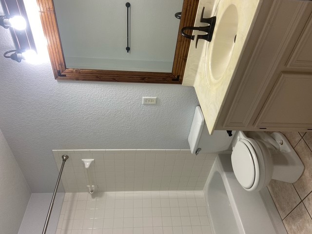 3700 Dustin Court, Unit B Killeen, TX 76549 - Photo 6 of 18 a bathroom with a sink a toilet and shower