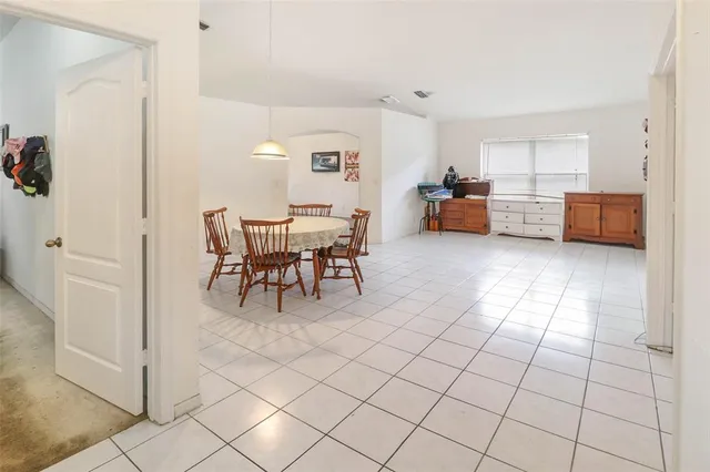 a view of a livingroom with furniture and window