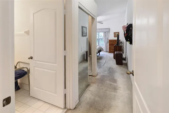 a view of a livingroom with couch and closet