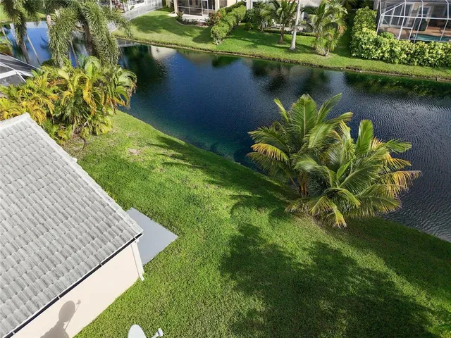 a view of a lake with a building in the background