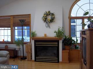 37 Eraser Road Moorestown, NJ 08057 - Photo 3 of 6 a living room with furniture and a fireplace