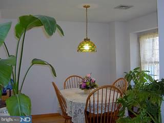 37 Eraser Road Moorestown, NJ 08057 - Photo 5 of 6 a view of a dining room with furniture window and flowerpot