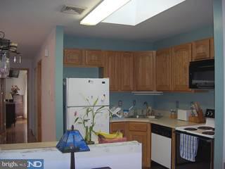 37 Eraser Road Moorestown, NJ 08057 - Photo 6 of 6 a kitchen with a sink a stove and refrigerator